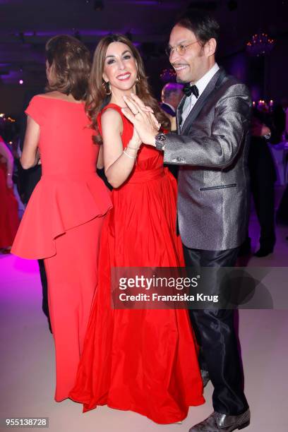 Judith Williams wearing a dress by Minx and her husband Alexander Klaus Stecher during the Rosenball charity event at Hotel Intercontinental on May...
