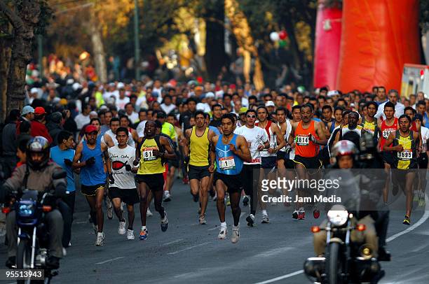View of Elite runners in action during the San Silvestre Road Race at the Reforma Avenue on December 31, 2009 in Mexico City, Mexico. Mexico's race...