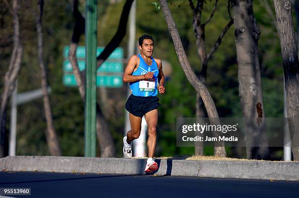 Juan Luis Barios from Mexico in action during the San Silvestre Road Race at the Reforma Avenue on December 31, 2009 in Mexico City, Mexico. Mexico's...