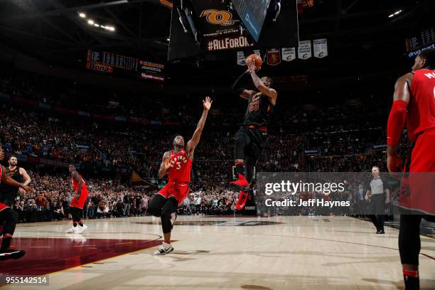 LeBron James of the Cleveland Cavaliers shoots game winning shot during game against the Toronto Raptors during Game Three of the Eastern Conference...