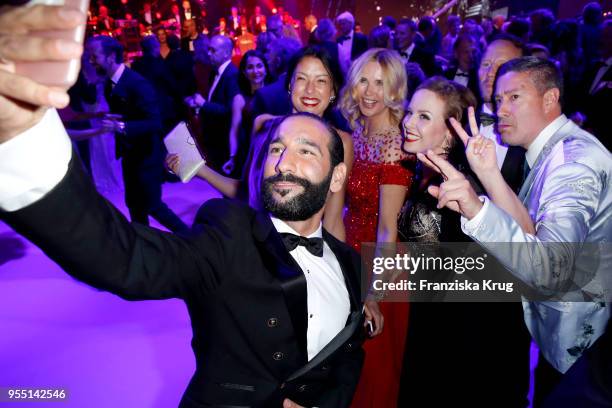 Massimo Sinato, Veronica Ferres, Rebecca Mir, Isabel Edvardsson and Joachim Llambi during the Rosenball charity event at Hotel Intercontinental on...