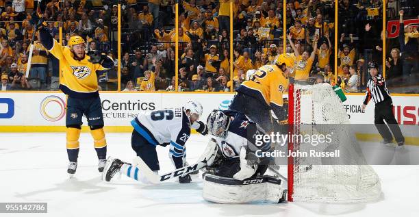 Ryan Johansen of the Nashville Predators scores short handed against Connor Hellebuyck of the Winnipeg Jets in Game Five of the Western Conference...