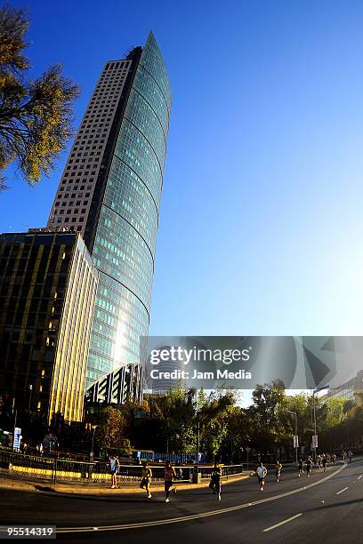 View of runners in action during the San Silvestre Road Race at the Reforma Avenue on December 31, 2009 in Mexico City, Mexico. Mexico's race...