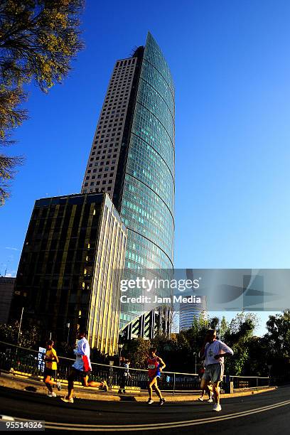 View of runners in action during the San Silvestre Road Race at the Reforma Avenue on December 31, 2009 in Mexico City, Mexico. Mexico's race...