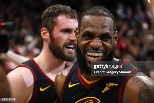 LeBron James of the Cleveland Cavaliers celebrates after hitting the game winning shot to beat the Toronto Raptors 105-103 in Game Three of the...