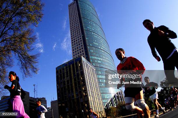 View of runners in action during the San Silvestre Road Race at the Reforma Avenue on December 31, 2009 in Mexico City, Mexico. Mexico's race...