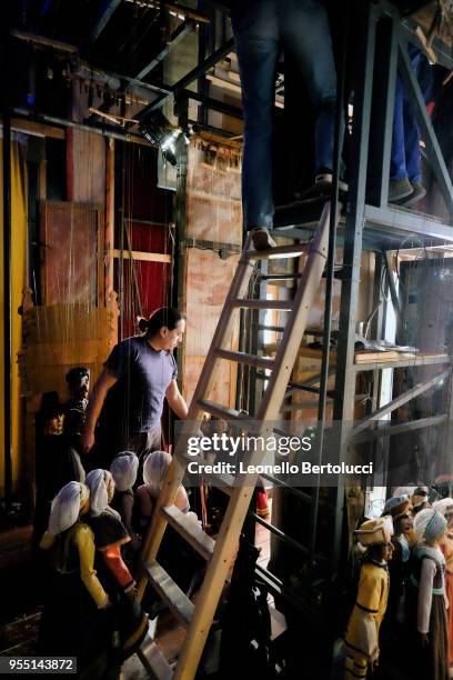 Moments of work behind the scenes during the show "Lamp of Aladdin" at the theater of the "Carlo Colla and Sons Marionette Company" on March 20, 2018...