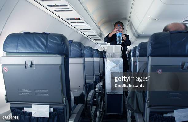 flight attendant - aisle seat airline stock pictures, royalty-free photos & images
