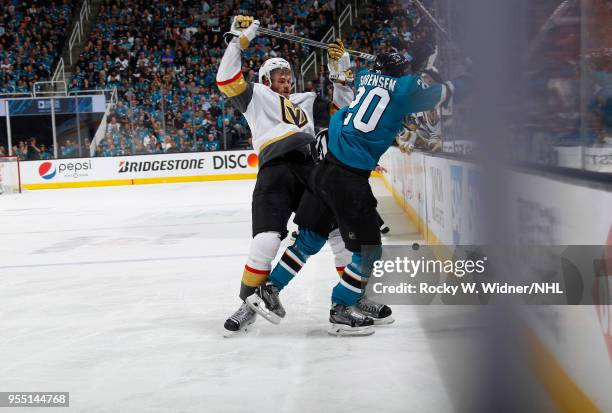 Marcus Sorensen of the San Jose Sharks collides into Jon Merrill of the Vegas Golden Knights in Game Four of the Western Conference Second Round...