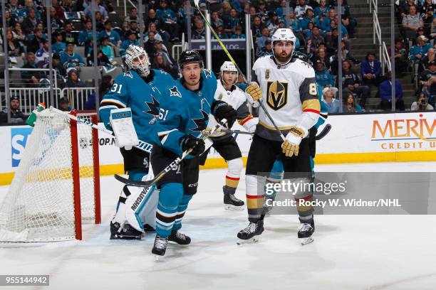 Justin Braun and Martin Jones of the San Jose Sharks defend the net against Alex Tuch of the Vegas Golden Knights in Game Four of the Western...