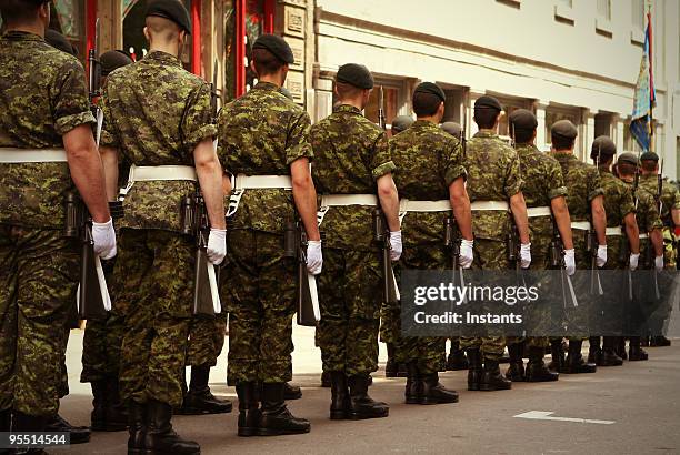 army soldiers - soldiers marching stock pictures, royalty-free photos & images