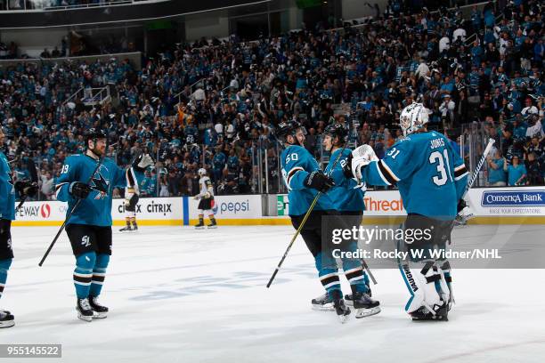 Chris Tierney and Martin Jones of the San Jose Sharks celebrate after defeating the Vegas Golden Knights in Game Four of the Western Conference...