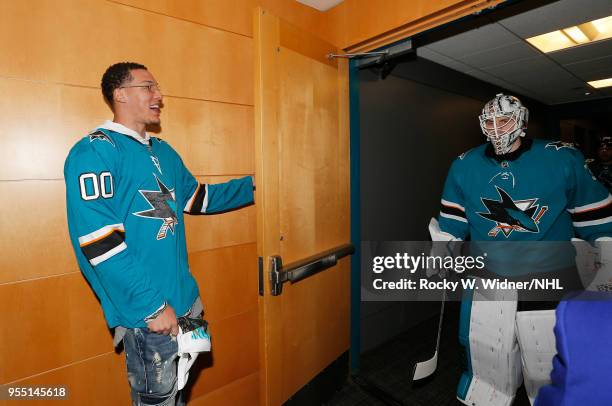 Aaron Gordon of the Orlando Magic greets Martin Jones of the San Jose Sharks prior to the game against the Vegas Golden Knights in Game Four of the...