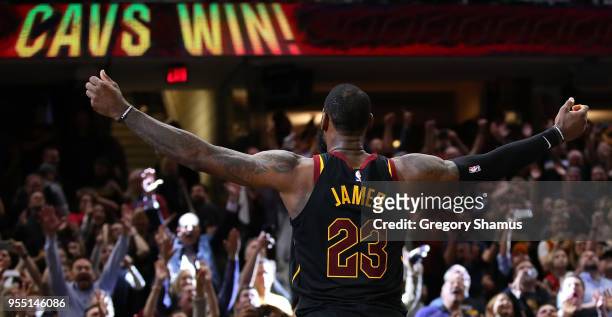 LeBron James of the Cleveland Cavaliers celebrates after hitting the game winning shot to beat the Toronto Raptors 105-103 in Game Three of the...