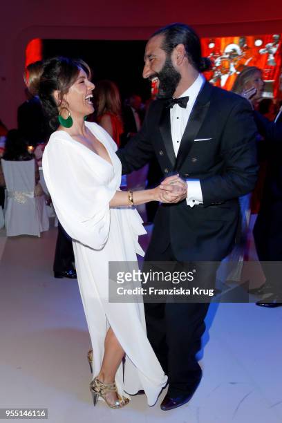 Nazan Eckes and Massimo Sinato during the Rosenball charity event at Hotel Intercontinental on May 5, 2018 in Berlin, Germany.