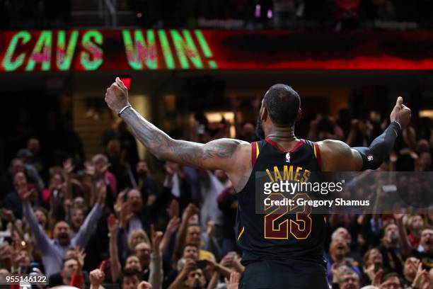 LeBron James of the Cleveland Cavaliers celebrates after hitting the game winning shot to beat the Toronto Raptors 105-103 in Game Three of the...