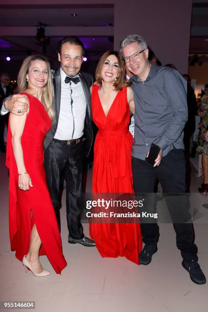 Nathalie Thelen, Alexander-Klaus Stecher, Judith Stecher-Williams wearing a dress by Minx and Frank Thelen during the Rosenball charity event at...