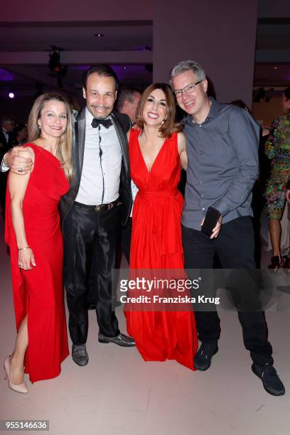 Nathalie Thelen, Alexander-Klaus Stecher, Judith Stecher-Williams wearing a dress by Minx and Frank Thelen during the Rosenball charity event at...