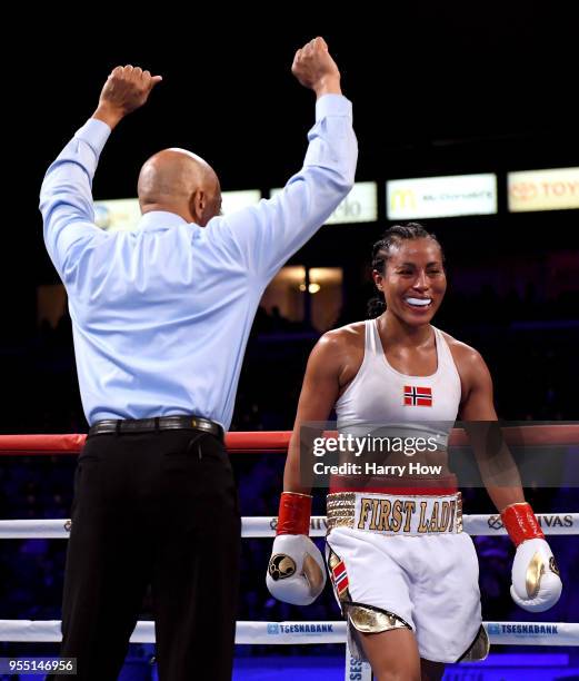 Cecilia Braekhus of Norway reacts to a count by the referee in her win over Kali Reis in a unanimous decision in the World Welterweight Championship...