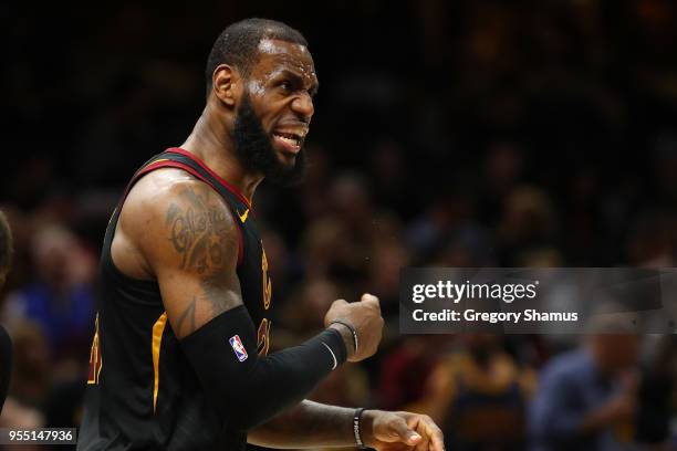 LeBron James of the Cleveland Cavaliers reacts in the first half while playing the Toronto Raptors in Game Three of the Eastern Conference Semifinals...