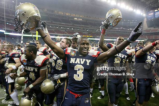 Safety Jesse Iwuji of the Navy Shipmen celebrates after the Texas Bowl at Reliant Stadium on December 31, 2009 in Houston, Texas. The Navy Shipmen...