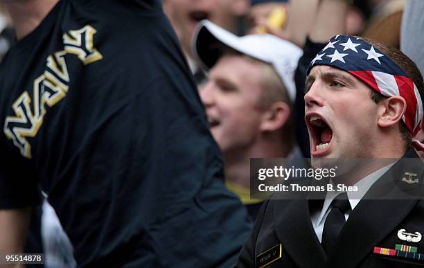 Navy Shipmen celebrate after the Texas Bowl at Reliant Stadium on December 31, 2009 in Houston, Texas. The Navy Shipmen beat the Missouri Tigers 35...