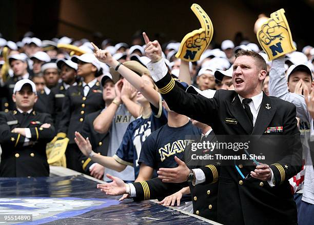 Navy Shipmen celebrates after the Texas Bowl at Reliant Stadium on December 31, 2009 in Houston, Texas. The Navy Shipmen beat the Missouri Tigers 35...