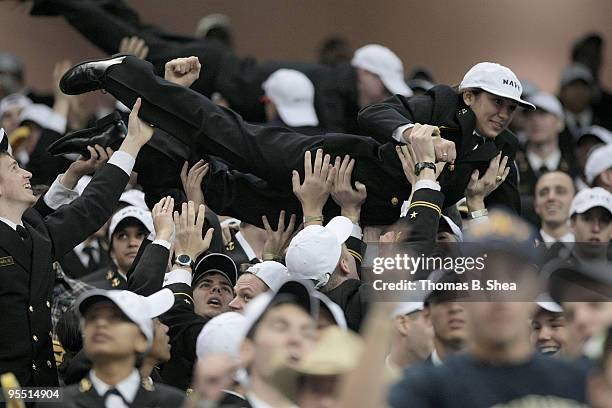 Navy Shipmen celebrates after the Texas Bowl at Reliant Stadium on December 31, 2009 in Houston, Texas. The Navy Shipmen beat the Missouri Tigers 35...