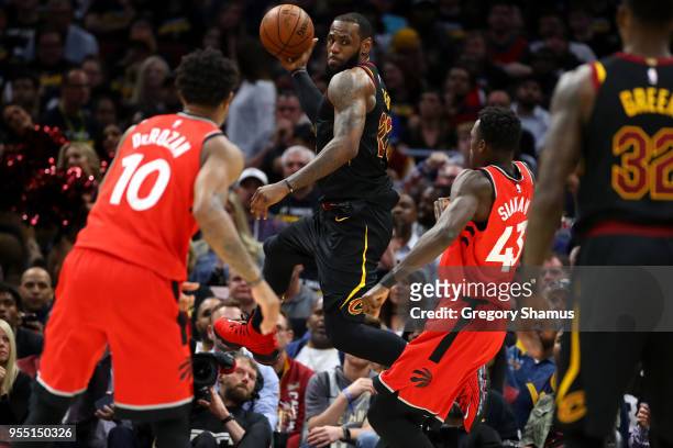 LeBron James of the Cleveland Cavaliers looks to pass around Pascal Siakam of the Toronto Raptors during the second half of Game Three of the Eastern...