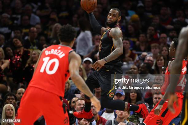 LeBron James of the Cleveland Cavaliers looks to pass around Pascal Siakam of the Toronto Raptors during the second half of Game Three of the Eastern...