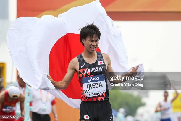 Koki Ikeda of Japan celebrates after winning Men's 20 kilometres Race Walk of IAAF World Race Walking Team Championships Taicang 2018 on May 6, 2018...