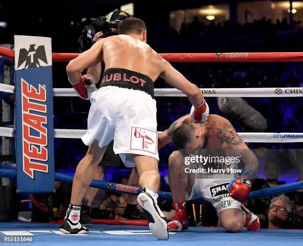 Gennady Golovkin knocks down Vanes Martirosyan on his way to a second round knockout win during the WBC-WBA Middleweight Championship at StubHub...