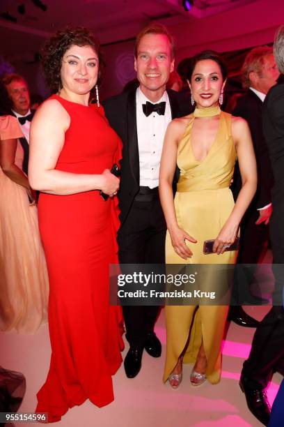 Nahid Shahalimi, Nils Behrens and Laila Hamidi during the Rosenball charity event at Hotel Intercontinental on May 5, 2018 in Berlin, Germany.