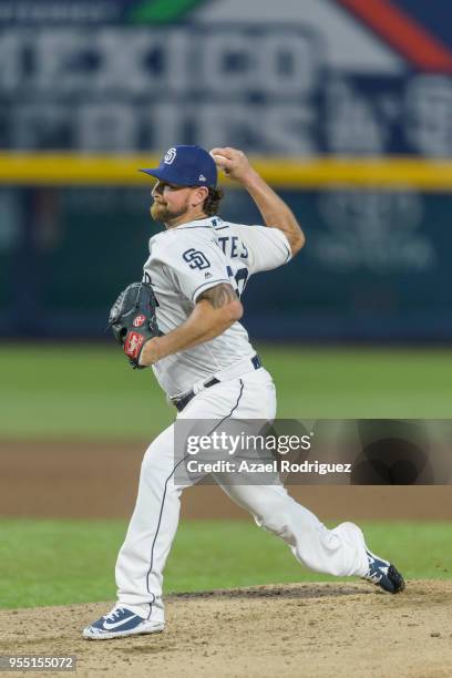 Relief pitcher Adam Cimber of San Diego Padres pitches on the sixth inning during the MLB game against the Los Angeles Dodgers at Estadio de Beisbol...