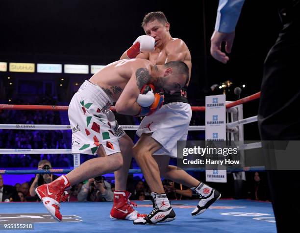 Gennady Golovkin watches Vanes Martirosyan react to his punch during a second round Golovkin knockout win during the WBC-WBA Middleweight...