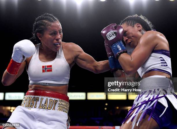 Cecilia Braekhus of Norway punches Kali Reis in a unanimous decision win in the World Welterweight Championship at StubHub Center on May 5, 2018 in...