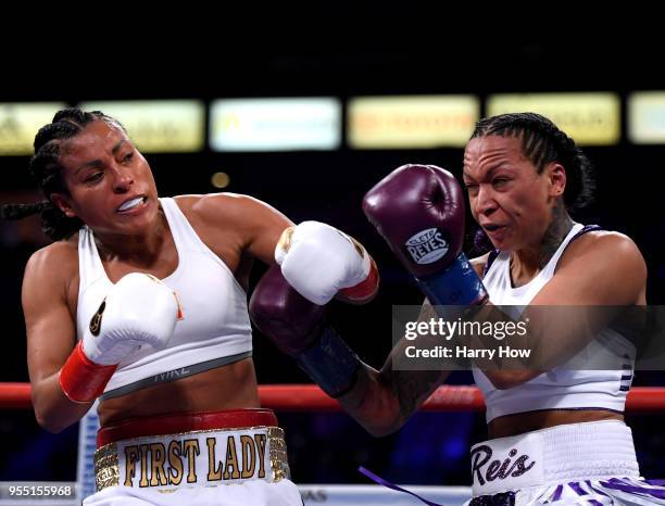 Cecilia Braekhus of Norway reacts to a punch from Kali Reis on her way to a unanimous decision win in the World Welterweight Championship at StubHub...