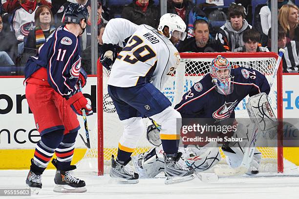 Goaltender Mathieu Garon of the Columbus Blue Jackets stops a shot from Joel Ward of the Nashville Predators on December 31, 2009 at Nationwide Arena...