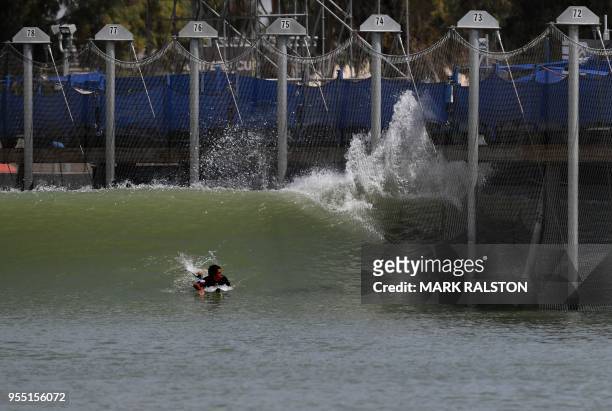 Jeremy Flores of France waits for his hydraulic generated wave during round one of the WSL Founders' Cup of Surfing, at the Kelly Slater Surf Ranch...