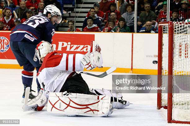 Kyle Palmieri of Team USA hits the post with the puck during the 2010 IIHF World Junior Championship Tournament game against Team Canada on December...