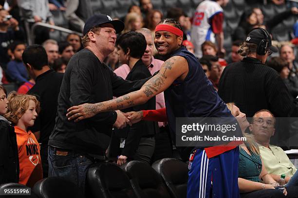 Actor Michael Rapaport greets Allen Iverson of the Philadelphia 76ers at Staples Center on December 31, 2009 in Los Angeles, California. NOTE TO...