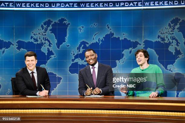 Donald Glover" Episode 1744 -- Pictured: Colin Jost, Michael Che, Pete Davidson during 'Weekend Update' in Studio 8H on Saturday, May 5, 2018 --