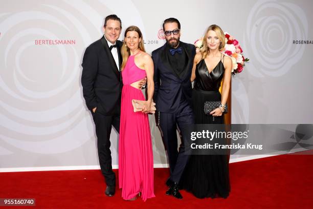 Sascha Vollmer, his wife Jenny Vollmer, Alec Voelkel and his wife Johanna Voelkel attend the Rosenball charity event at Hotel Intercontinental on May...