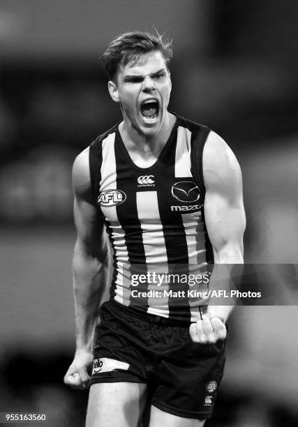 Mason Wood of the Kangaroos celebrates kicking the final goal during the round seven AFL match between the Sydney Swans and the North Melbourne...