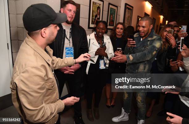 Dynamo performs card trick with Chris Eubank Jr backstage following the David Haye v Tony Bellew Fight at The O2 Arena on May 5, 2018 in London,...