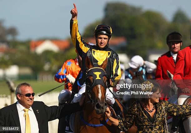 Michael Rodd riding A Gold Trail celebrates after winning the Railway Stakes during the New Zealand Christmas Carnival meeting at Ellerslie...