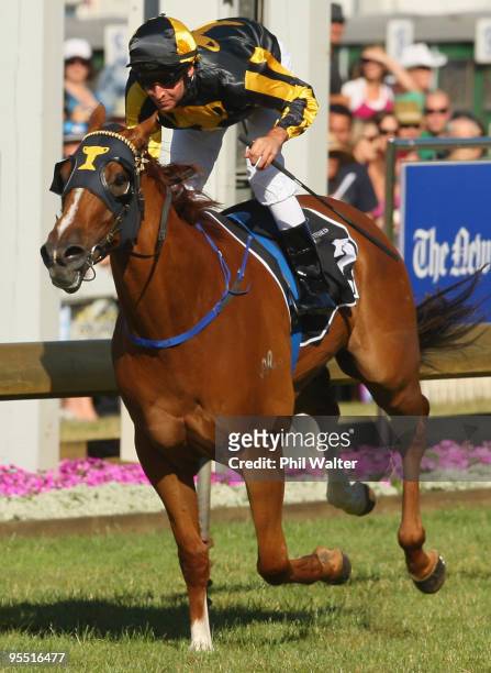 Michael Rodd riding A Gold Trail wins the Railway Stakes during the New Zealand Christmas Carnival meeting at the Ellerslie Racecourse on January 1,...