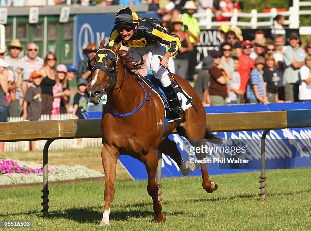 Michael Rodd riding A Gold Trail wins the Railway Stakes during the New Zealand Christmas Carnival meeting at the Ellerslie Racecourse on January 1,...