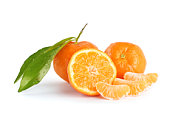 Whole and sliced mandarins on a white background