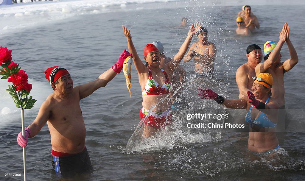 Winter Swimmers Take To The Water To Celebrate The New Year